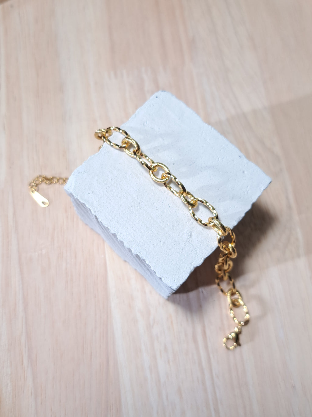 Bracelet doré maillons torsadés