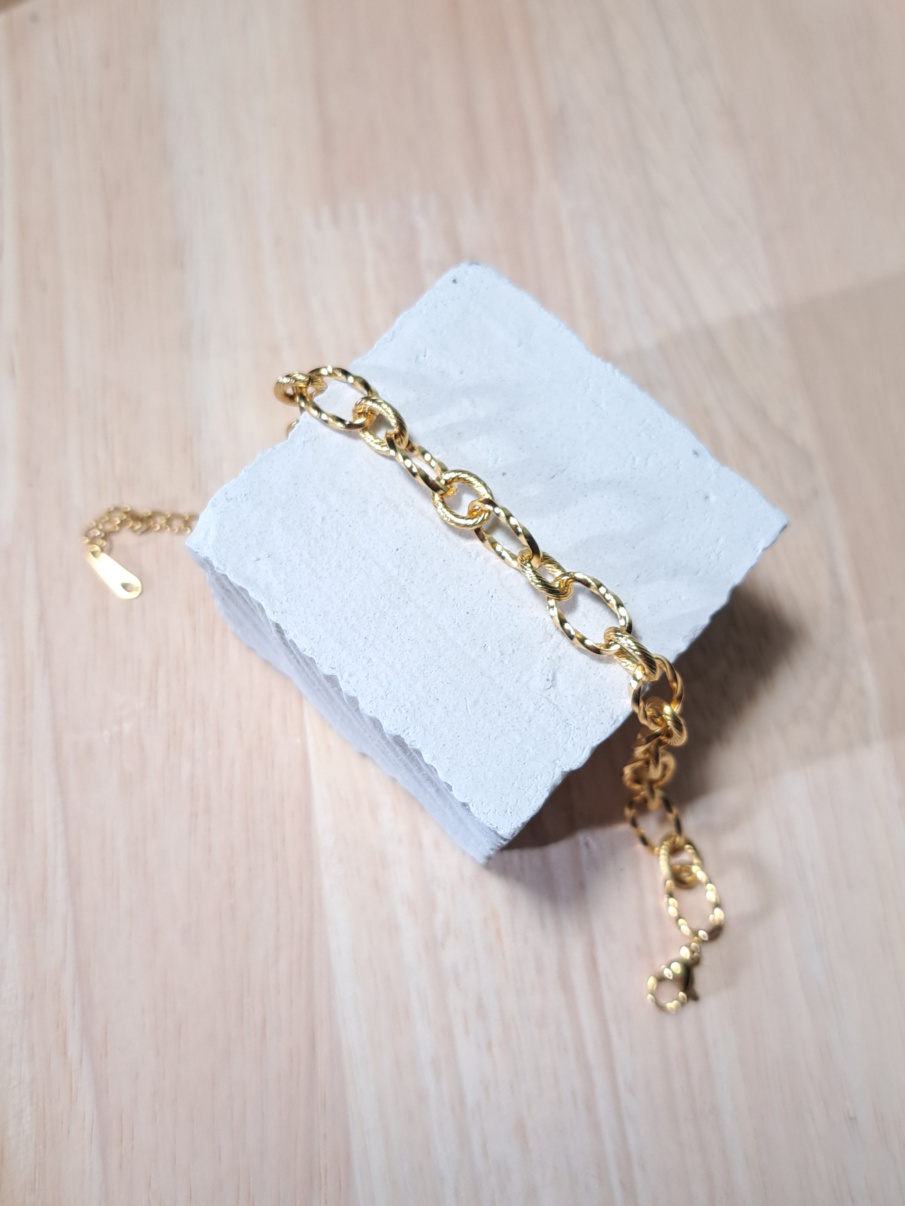 Bracelet doré maillons torsadés