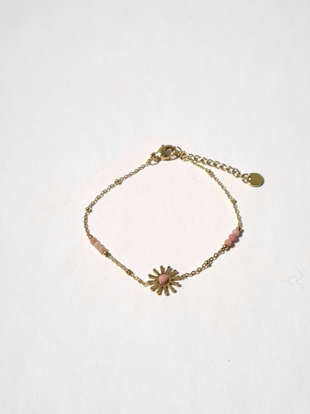 Bracelet acier doré avec charm soleil Rose