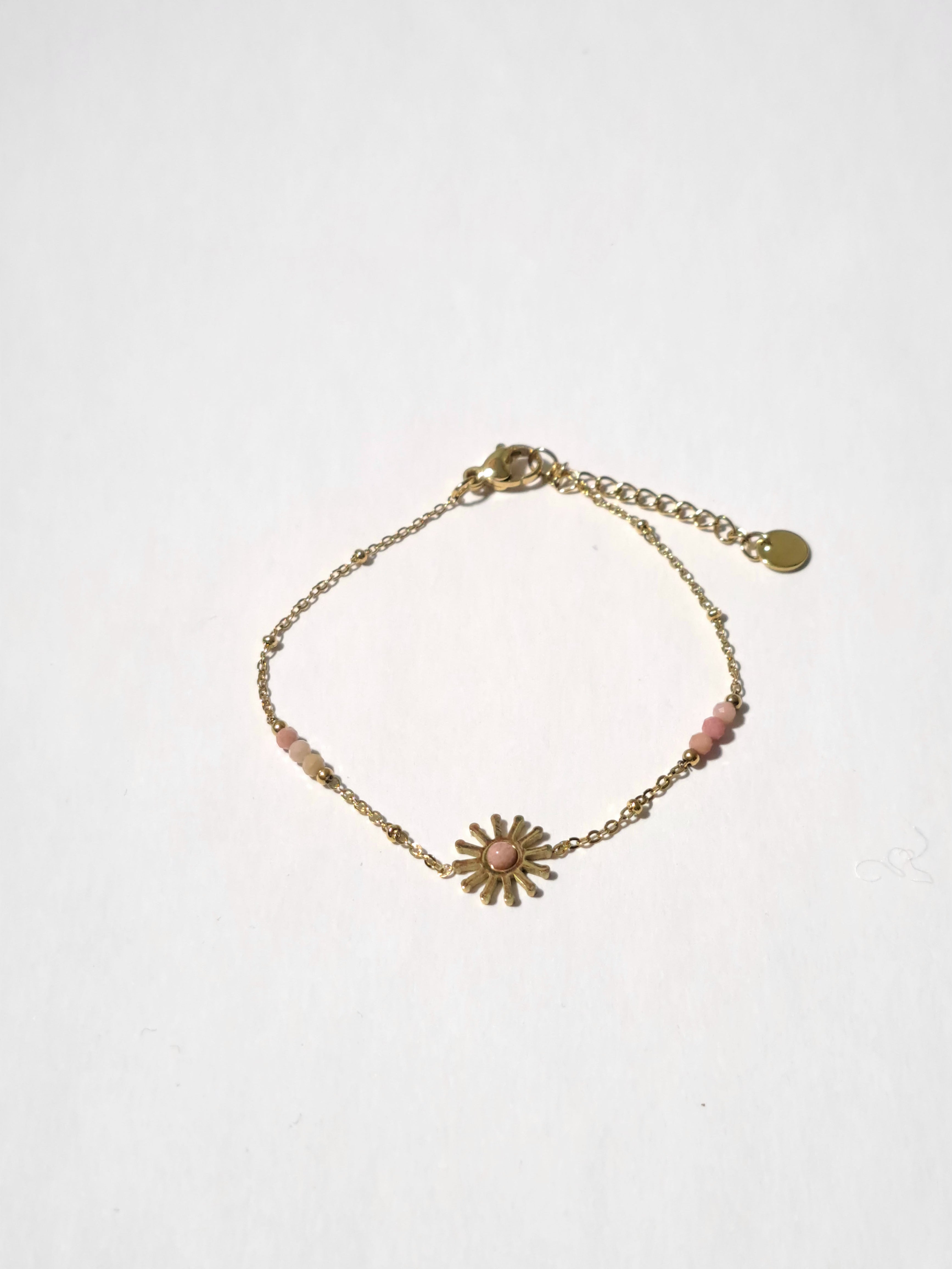 Bracelet acier doré avec charm soleil Rose