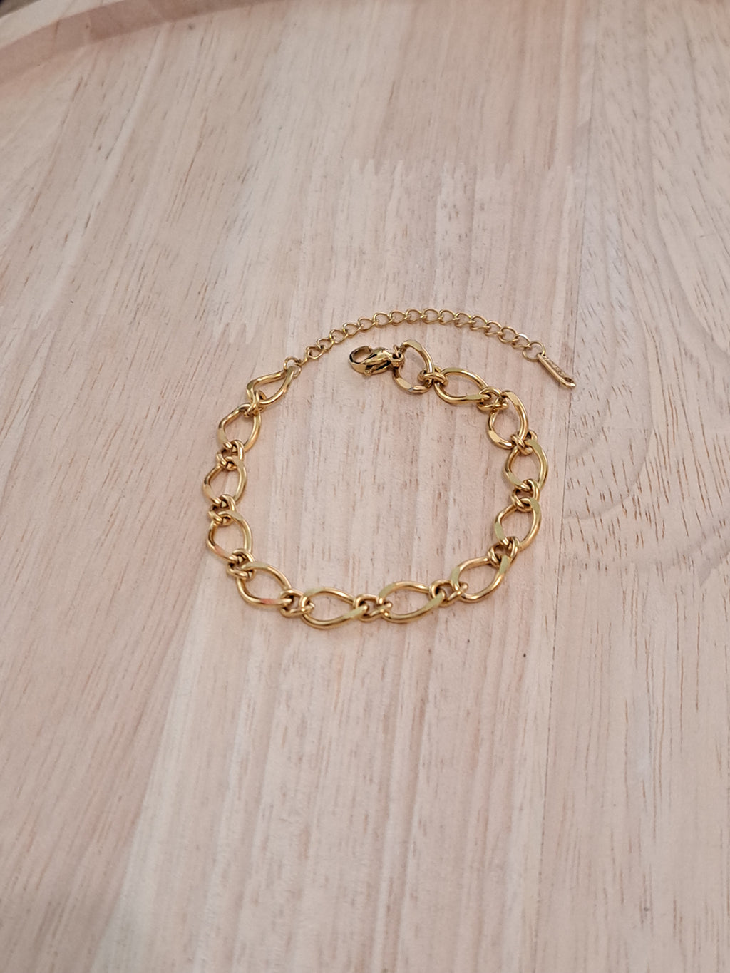 Bracelet doré maillons fins entrelacés